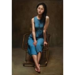 油画——《坐在摇椅上的兰衣女子》——林金福